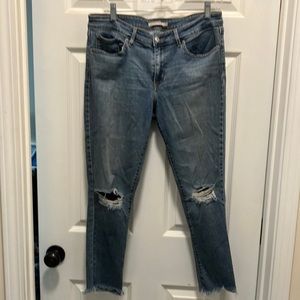 Levi’s 711 skinny is very soft, light, blue distressed knees